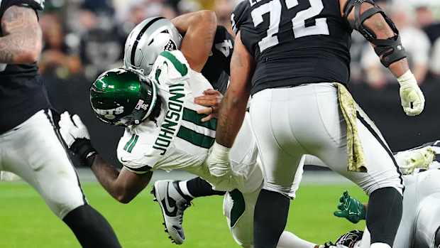 Jets' DE Jermaine Johnson (11) sacks Raiders' QB Aidan O'Connell